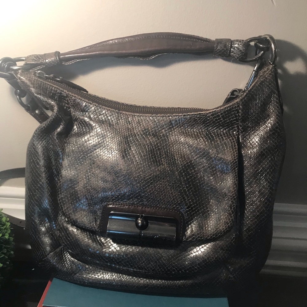 Coach embossed python snake skin shoulder bag.